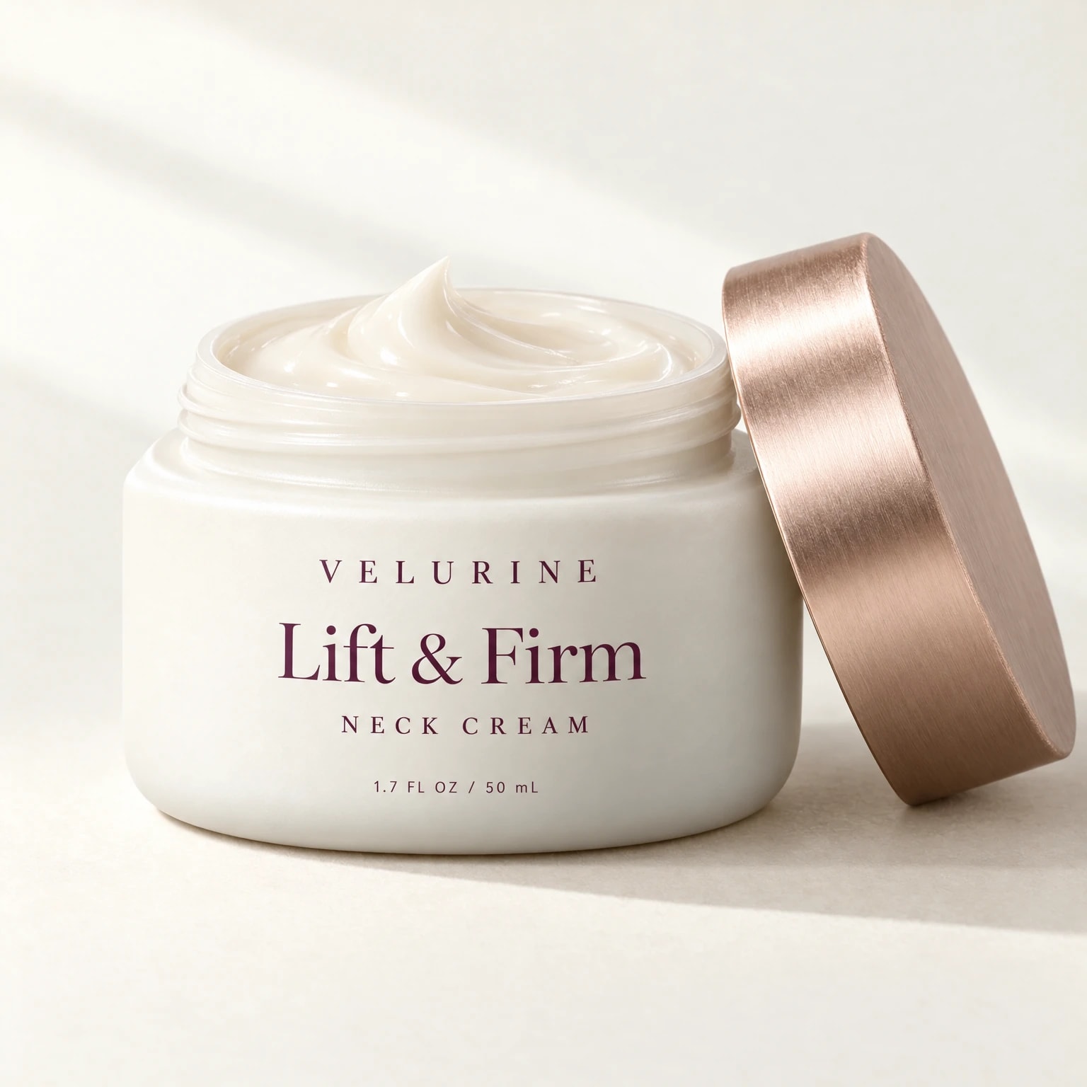 The open jar, showing the smooth ivory cream